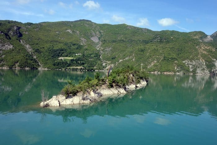 The 3 hour ferry ride through the mountains of Northern Albania that blew us away (and should be on everyones bucket list!), shkoder, skhoder, albania, tirana, mountains, adventure, hike, off the beaten track, off the beaten path, explore, ferry, valbona, albanian alps, Koman, komani, lake, local, rural, fjords, feirze, things to do in Albania, things to see