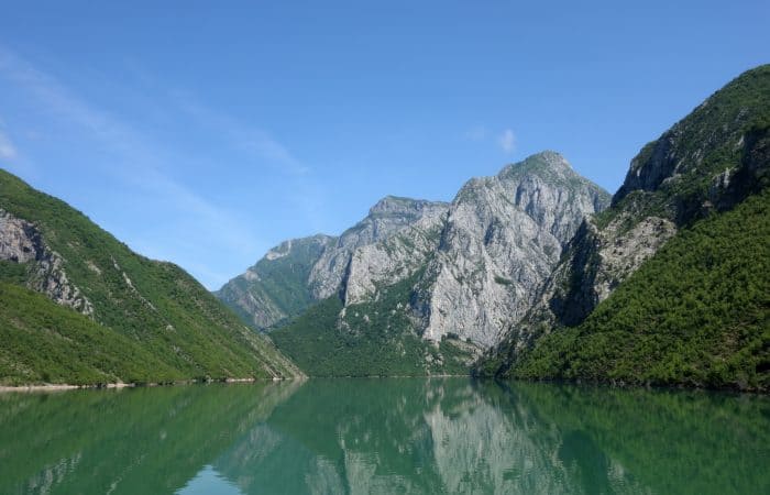 The 3 hour ferry ride through the mountains of Northern Albania that blew us away (and should be on everyones bucket list!), shkoder, skhoder, albania, tirana, mountains, adventure, hike, off the beaten track, off the beaten path, explore, ferry, valbona, albanian alps, Koman, komani, lake, local, rural, fjords, feirze, things to do in Albania, things to see