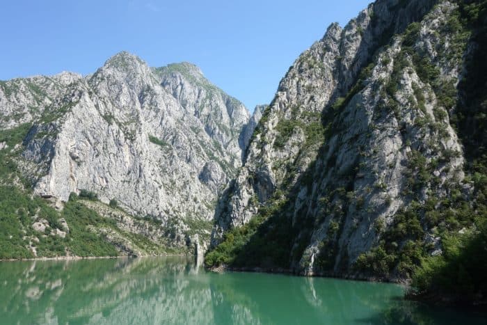Albania: A surprise love affair with this chaotic time warp country with stunning landscapes and wonderful people!, tirana, berat, bogove waterfall, lake komani, rural, culture, what is albania like, is albania scary, is albania safe, places to see in Albania, transport in albania, backpacking in albania, the people, freindly, nice, welcoming, culture,