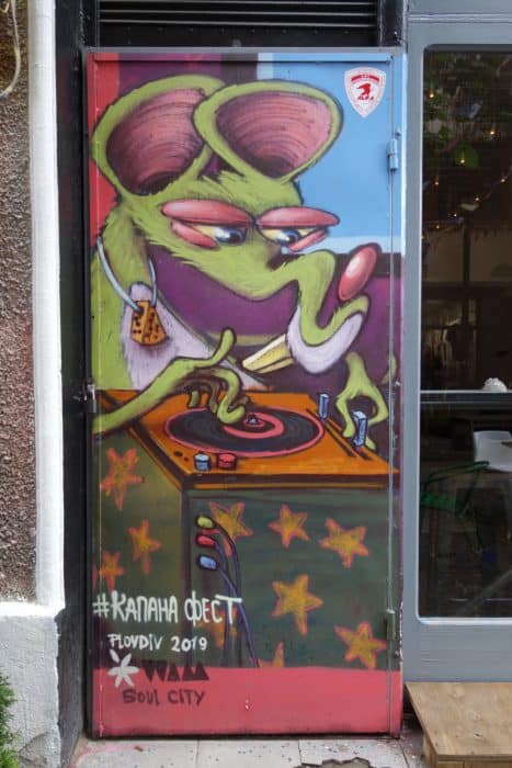 Plovdiv: The ancient Roman city with a young bohemian charm, amazing street art, climbing, scrambling, hill, explore, adventure, things to do in Plovdiv, things to see, what to do, top 10, ten, Ottoman, Old Town, Balabanov's house, Danov house, ethnographic museum, graffiti, Roman amphitheatre, Alyosha Soviet Army Memorial, viewpoint, Bunarjik Hill, Alyosha Skurlatov, Roman Stadium, hike, Trimontium, Dzhumaya Mosque, The trap, Kapana, art, creative, craft, artists, airBnB