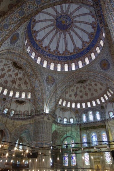 Istanbul, places to see in istanbul, history, asia, Europe, things to do, top things to see, what to do, where to go, turkey, turkiye, adventure, explore, romance of travel, bucket list,Hagia Sophia, Haggia, Sofia, Blue Mosque, Sultan Ahmed Mosque, Byzantine, Ottoman, sultan, how old is the blue mosque, how old is the hagia sophia, what do I need to wear to visit the Blue Mosque, clothing, requirements, price, cost, opening times, restrictions, women, men, legs, head, scarf, muslim, islam, prayer, call to prayer, minarets, why is the blue mosque called the blue mosque, tiles, decoration, age, open to visitors, tourists, can I go inside the blue mosque, 