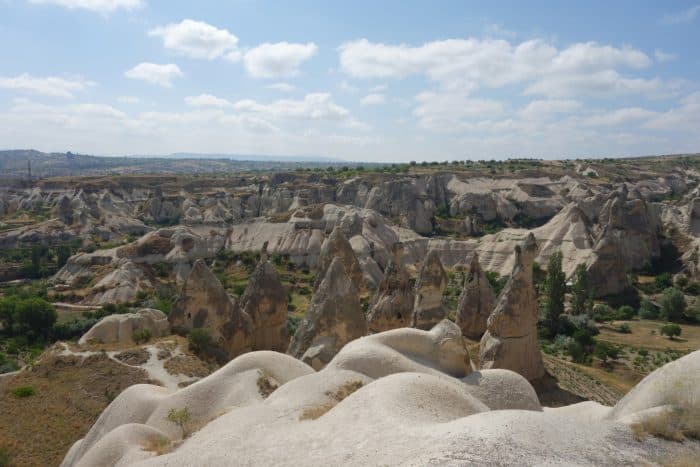 A guide to Cappadocia: The magical, dream like, out of this world landscape that we flew above, history, asia, Europe, things to do, top things to see, what to do, where to go, turkey, turkiye, adventure, explore, romance of travel, bucket list, Fethiye, Goreme, Nevsehir, how to get to cappadocia, bus, flight, plane, Kayseri, Byzantine, Uchisar, Balloon Ride, fairy chimneys, Rose Valley, Cavusin villages, Pigeon Valley, Mount Erciyes, Uchisar castle, Derinkuyu, underground city, Ihlara Valley, desert, Melendiz river, Ağaçaltı cave church, Selime Monastery, things to do in Cappadocia, where to go in cappadocia, 