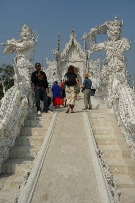 Chiang Rai White Temple, Exploring the strange world of the White Temple, Chiang Rai: This beautiful and weird work of art, artist, buddhist, buddhism, installation, sculpture, gallery, Spiderman, superman, predator, George Bush, Twin Towers, Chalermchai Kositpipat, Wat Rong Khun, temple, The White Temple, How to get to Wat Rong Khun from Chiang Rai, How to get to The white temple from Chiang Rai, Chiang Mai, Bus, Laos, Mekong, slow boat, terminator, hellraiser, freddie Krugger, Batman, Deadpool 