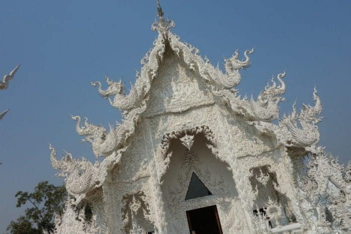 Chiang Rai White Temple, Exploring the strange world of the White Temple, Chiang Rai: This beautiful and weird work of art, artist, buddhist, buddhism, installation, sculpture, gallery, Spiderman, superman, predator, George Bush, Twin Towers, Chalermchai Kositpipat, Wat Rong Khun, temple, The White Temple, How to get to Wat Rong Khun from Chiang Rai, How to get to The white temple from Chiang Rai, Chiang Mai, Bus, Laos, Mekong, slow boat, terminator, hellraiser, freddie Krugger, Batman, Deadpool 