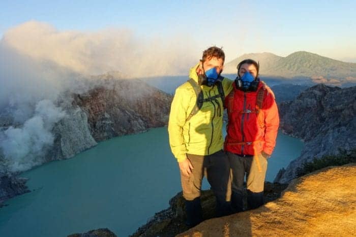 Ijen volcano hike, sunrise, Climbing the smouldering live volcano Mt Ijen in protective masks for sunrise over the sulphuric acid lake and blue flame crater, Indonesia, Karangasem, Ijen price, ijen volcano cost, Ijen volcano, Ijen Crater, Ijen volcano blue flame, blue fire, Ijen crater tour, ijen plateau, ijen volcano tour, ijen and Bromo, Ijen acid lake, ijen and Bromo tour, ijen from Bali, Ijen to Bali, Gas mask volcano, dangerous hike, most dangerous hikes, Indonesia volcano, Java, Probelingo, homestay, accommodation, Kawah Ijen, Banyuwangi, Acid lake, Blue lagoon, crater lake, acid volcano lake, volcano erupt, sulphur mining, sulphur smoke, 