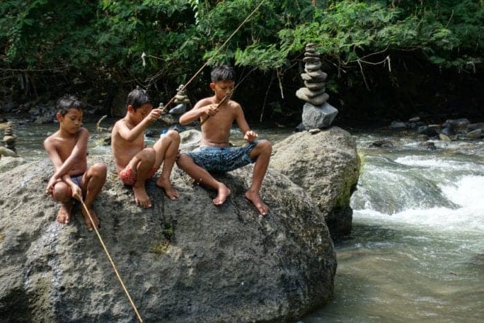 Things to do in Bali, off the beaten track Bali, Off the beaten path Bali, alternative things to do in Bali, tourists, is bali too touristy, too many tourists in Bali, waterfalls, rice terraces, temples, real Bali, Authentic Bali, scooter Bali, hiring a scooter in Bali, Tegenungan Waterfall, Gitgit waterfal, Munduk Waterfall, Aling Aling Waterfall, Sekumpul Waterfall, NungNung Waterfall, Mt Agung, Mt Batur, live volcano Bali, hiking Bali, adventure Bali, Tanah Lot, Besakih Temple, Pura Tirta Empul, Pura Ulun Danu Beratan, Pura Dalem Agung, Goa Gajah, Ubud, best places to stay in Bali, away from the tourists, Gunung Kawi, Ubud Palace, Tegallaland rice terraces, price, Jatiluwih rice terraces, hindu festivals, festivals Bali, Beaches, dirt bike, Surfing, local culture, gate, Monkey forest, sacred monkey temple, monkey on head Bali, Java, transport, ferry