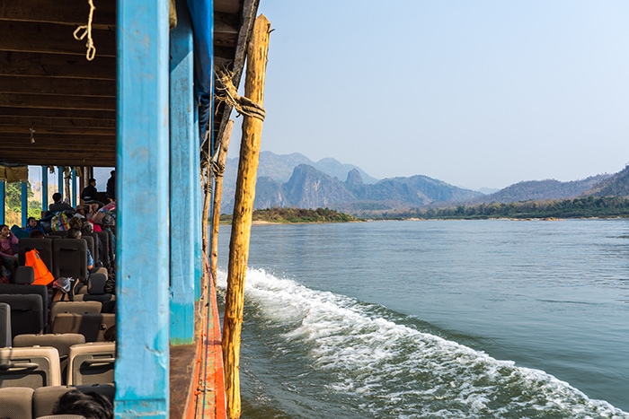 Luang Prabang to Chiang Mai slow boat, Taking the 2 day slow boat down the Mekong River from Luang Prabang, Laos to Chiang Rai, Thailand and how to do it yourself, two day, slow boat, Laos, Pak Beng, Huay Xai, Chiang Mai, Chiang Rai, Chiang Khong, tuk tuk, price, time, how long does the slow boat take, how to take the slow boat from Laos to Thailand, Thailand to Laos, Luang Prabang to Chiang Mai, backpacking, Chiang Mai to Laos slow boat, Boat from Thailand to Laos, Mekong, River cruise, Luang Prabang to Chiang Mai, Slow boat, Chiang Mai to Luang Prabang, Luang Prabang to Chiang Mai, slow boat to Luang Prabang, travel from luang prabang to chiang mai, chiang mai slow boat to luang prabang, chiang mai to laos, luang prabang to chiang rai boat, chiang rai luang prabang, luang prabang to chiang mai bus, luang prabang to chiang rai boat, Slow boat Luang Prabang to Chiang Mai,