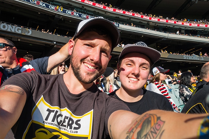 Shorty and Nic taking a selfie at the MCG in Melbourne, whilst watching AFL.