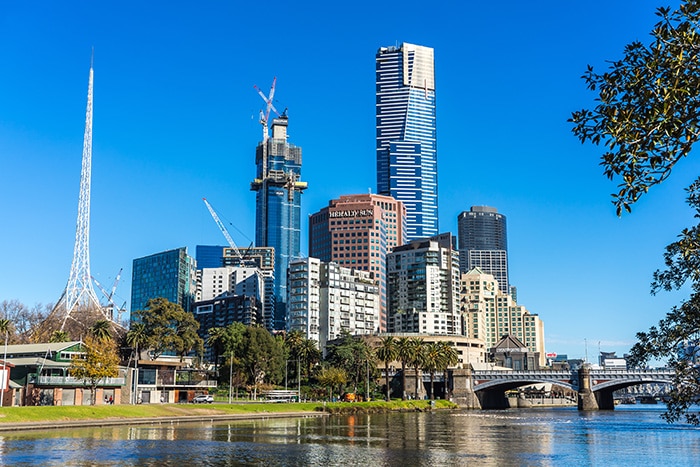 A view of the Melbourne skyline and Princes Bridge from the Yarra River on a lovely sunny day.