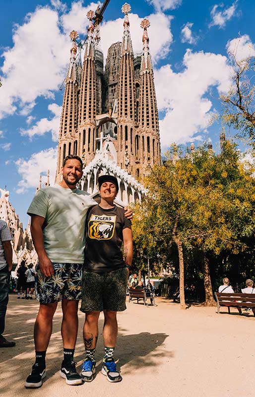 romantic weekend breaks Europe. Nic and Shorty standing in front of the Sagrada Família in Barcelona, Spain. 