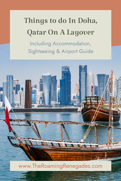 Cover featured image page for the post "things to do in Doha on a layover" featuring two dhow boats in the harbour across from the skyscrapers of West Bay in Qatar.