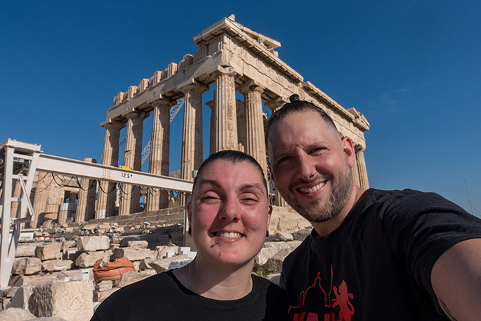 Nic and Shorty taking a selfie in Athens at the Acropolis in Greece on a sunny day
