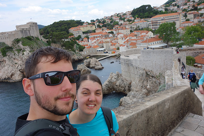 Nic and Shorty taking a selfie on the walls of the old town of Dubrovnik with the harbour in the distance in Croatia. europe romantic city breaks