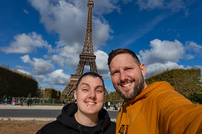 Nic and Shorty taking a selfie in Paris, France with the Eiffel Tower in the background. Best Romantic European City Breaks